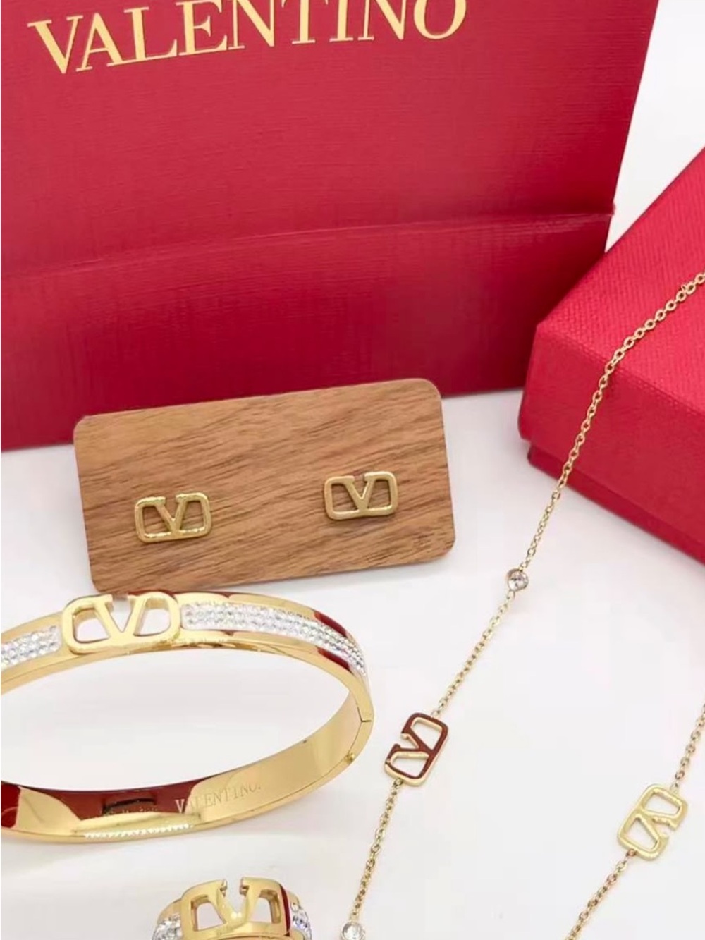 Valentino Gold and Red Logo Bracelet with Matching Gold Accents